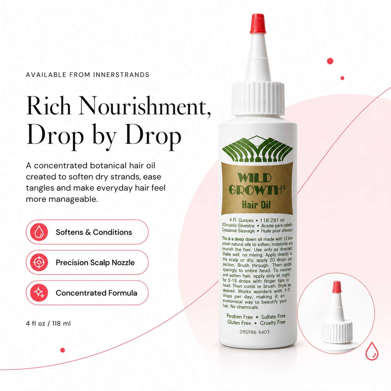 InnerStrands Sunset Pink red light scalp care brush shown from the front and illuminated bristle side