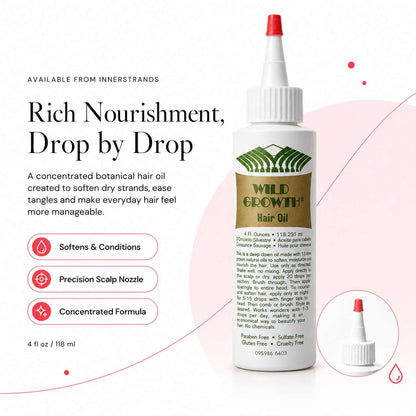 InnerStrands Sunset Pink red light scalp care brush shown from the front and illuminated bristle side